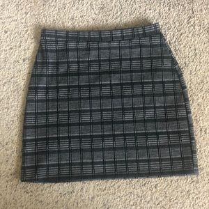 Small Black and White Formfitting Plaid Skirt